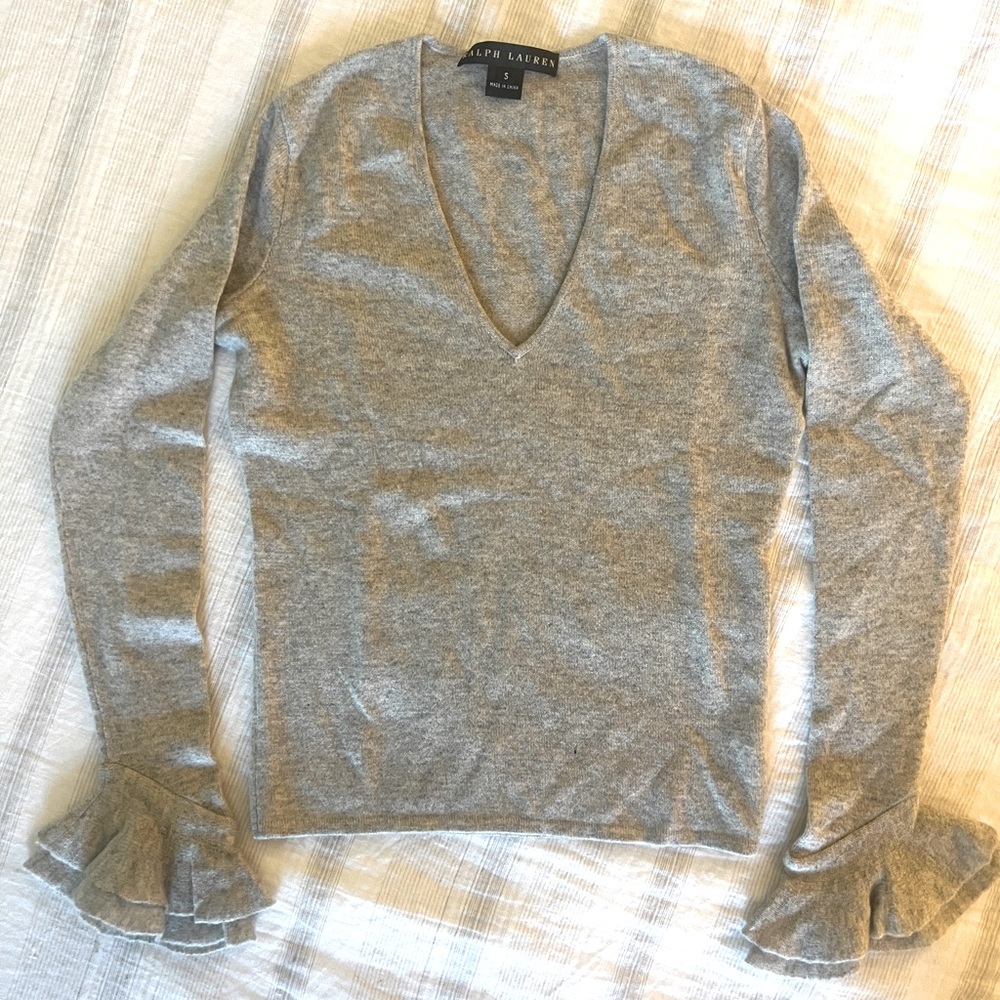 Ralph Lauren Black Label Cashmere V-Neck Sweater with ruffle sleeves.